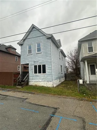 a view of a house with street