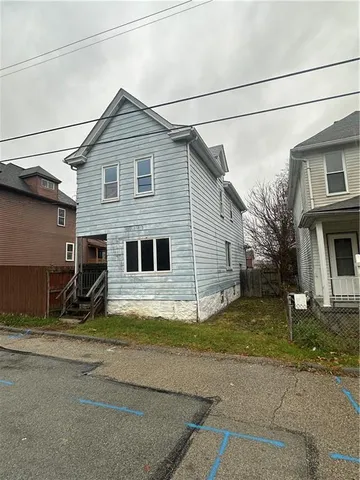 a view of a house with street