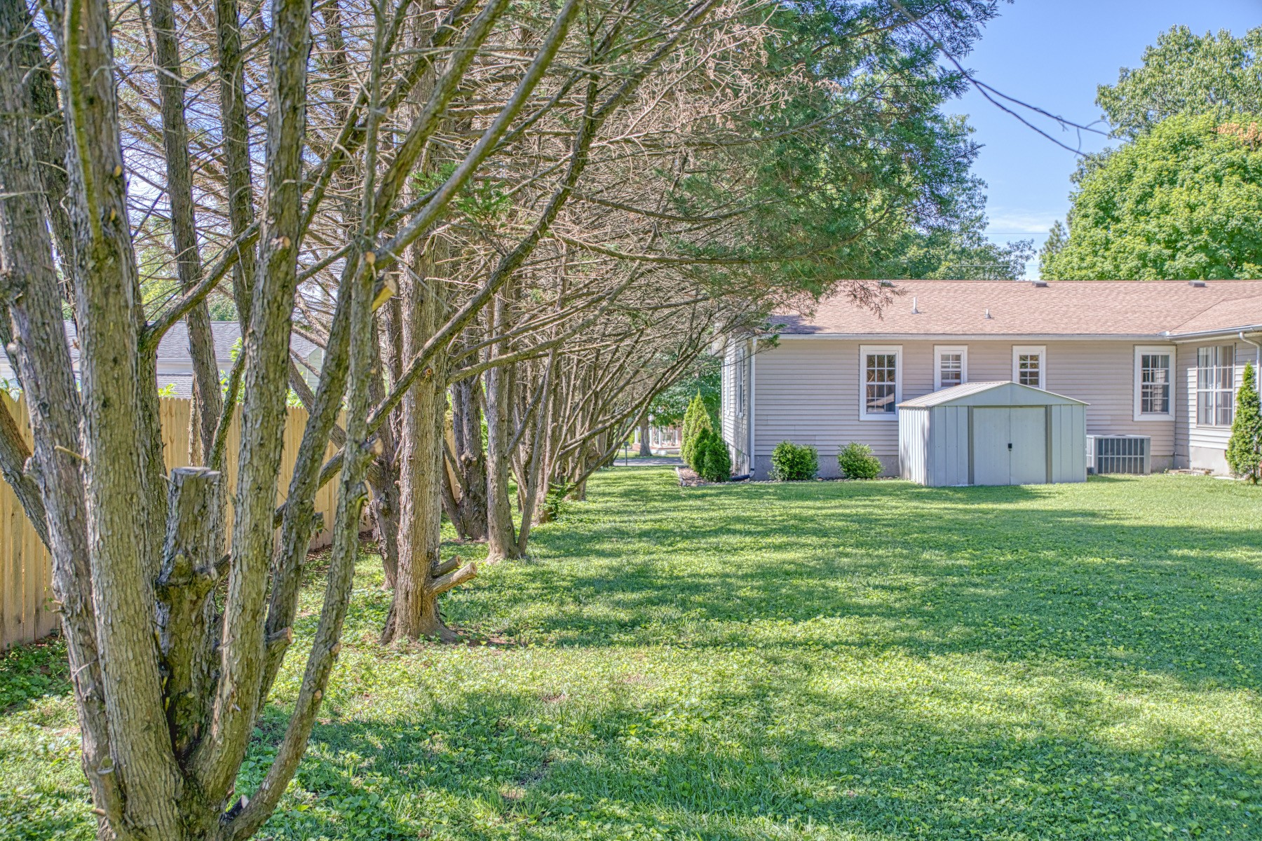 2085 Herbert Garrett Road Cookeville, TN 38506 - Photo 38 of 39 a view of a house with backyard and garden