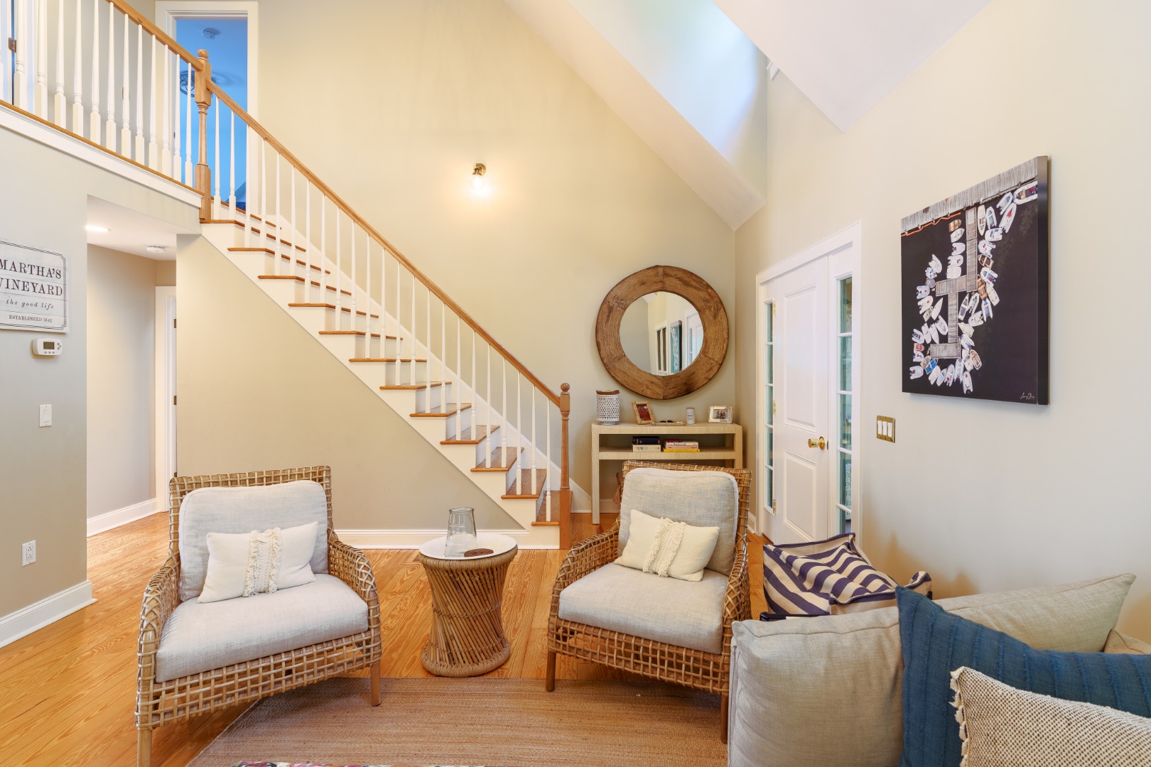 70 Marthas Road Edgartown, MA 02539 - Photo 14 of 54 a living room with furniture and a mirror