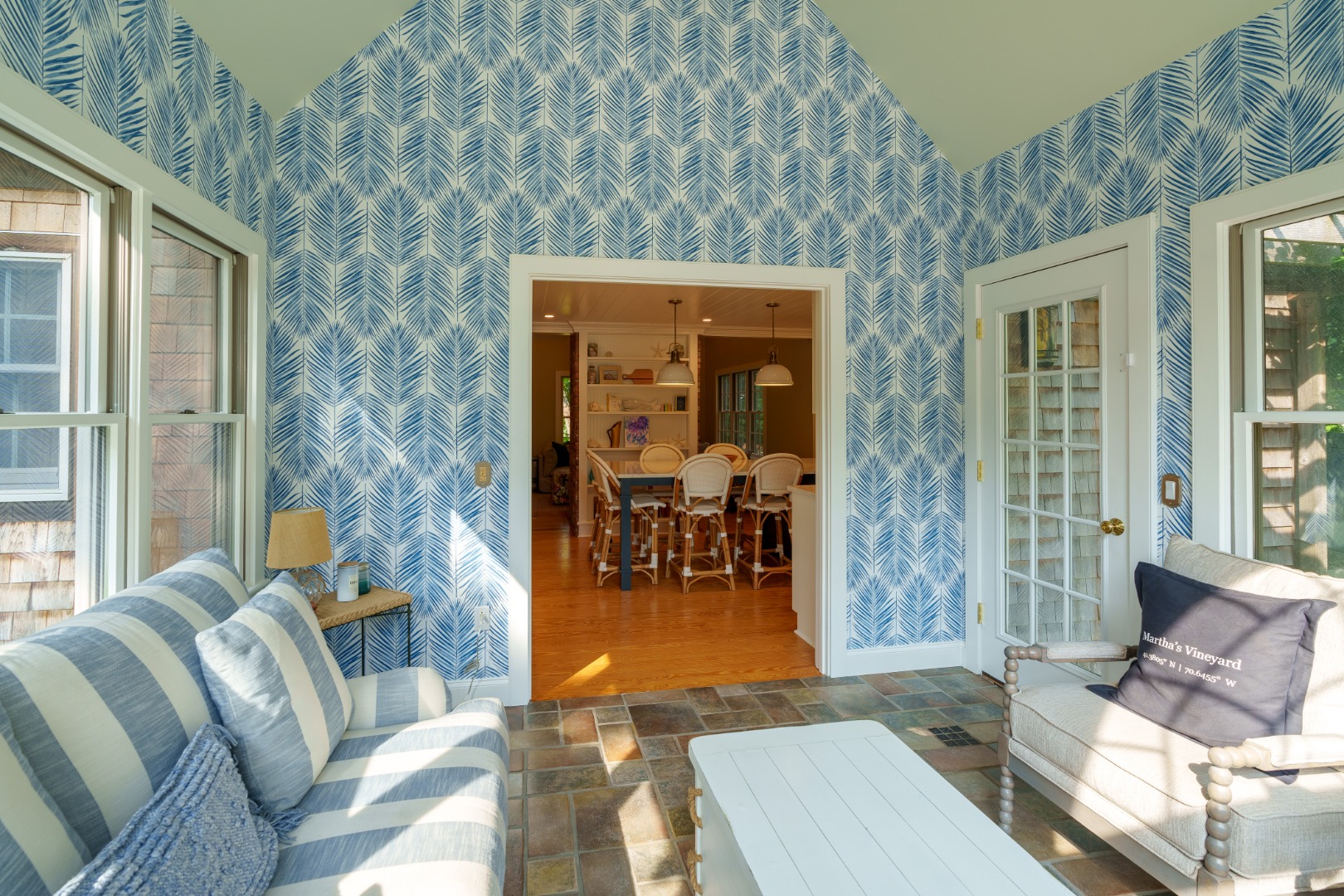 70 Marthas Road Edgartown, MA 02539 - Photo 24 of 54 a living room with furniture and a floor to ceiling window