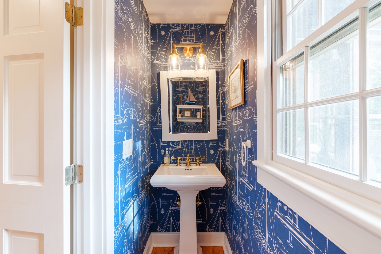 70 Marthas Road Edgartown, MA 02539 - Photo 25 of 54 a bathroom with a sink and a mirror