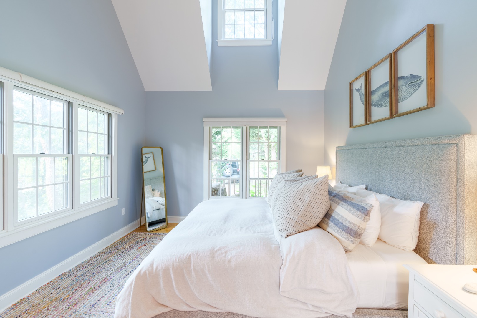 70 Marthas Road Edgartown, MA 02539 - Photo 28 of 54 a large bed sitting in a bedroom next to a window