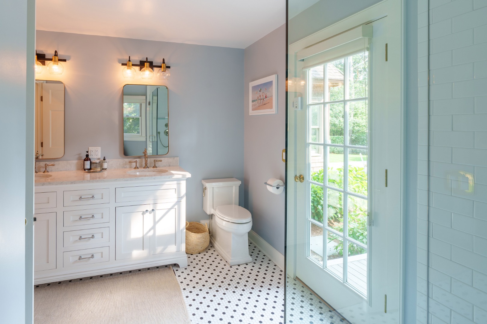 70 Marthas Road Edgartown, MA 02539 - Photo 33 of 54 a bathroom with a double vanity sink toilet and a mirror