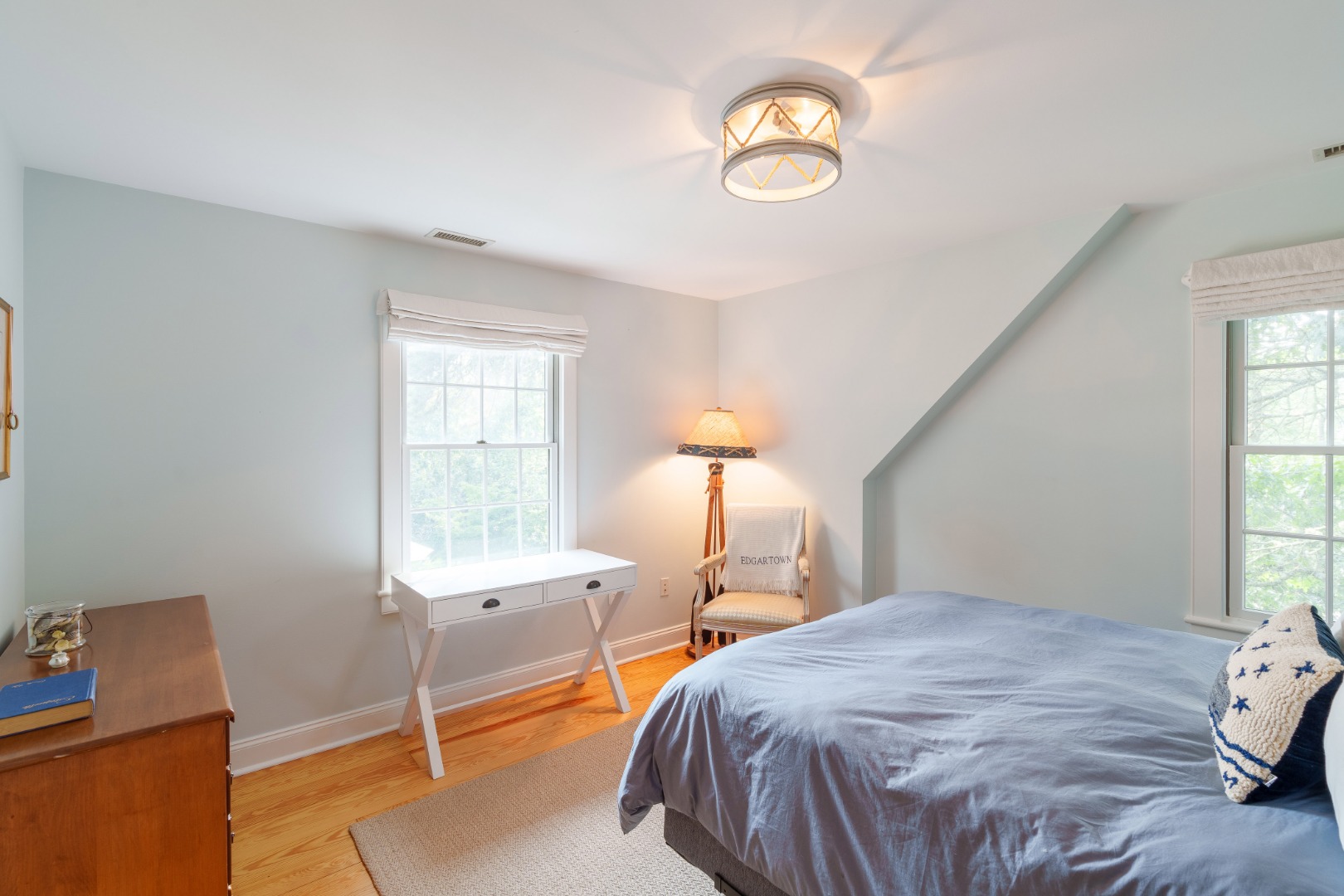 70 Marthas Road Edgartown, MA 02539 - Photo 40 of 54 a bedroom with a bed and a window