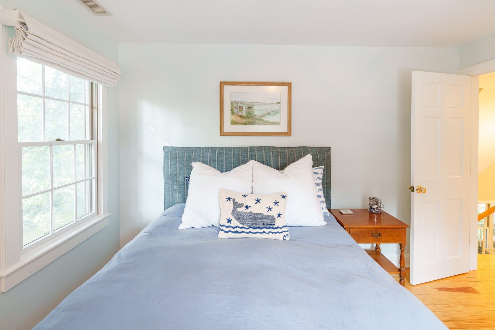 70 Marthas Road Edgartown, MA 02539 - Photo 42 of 54 a spacious bedroom with a bed and window