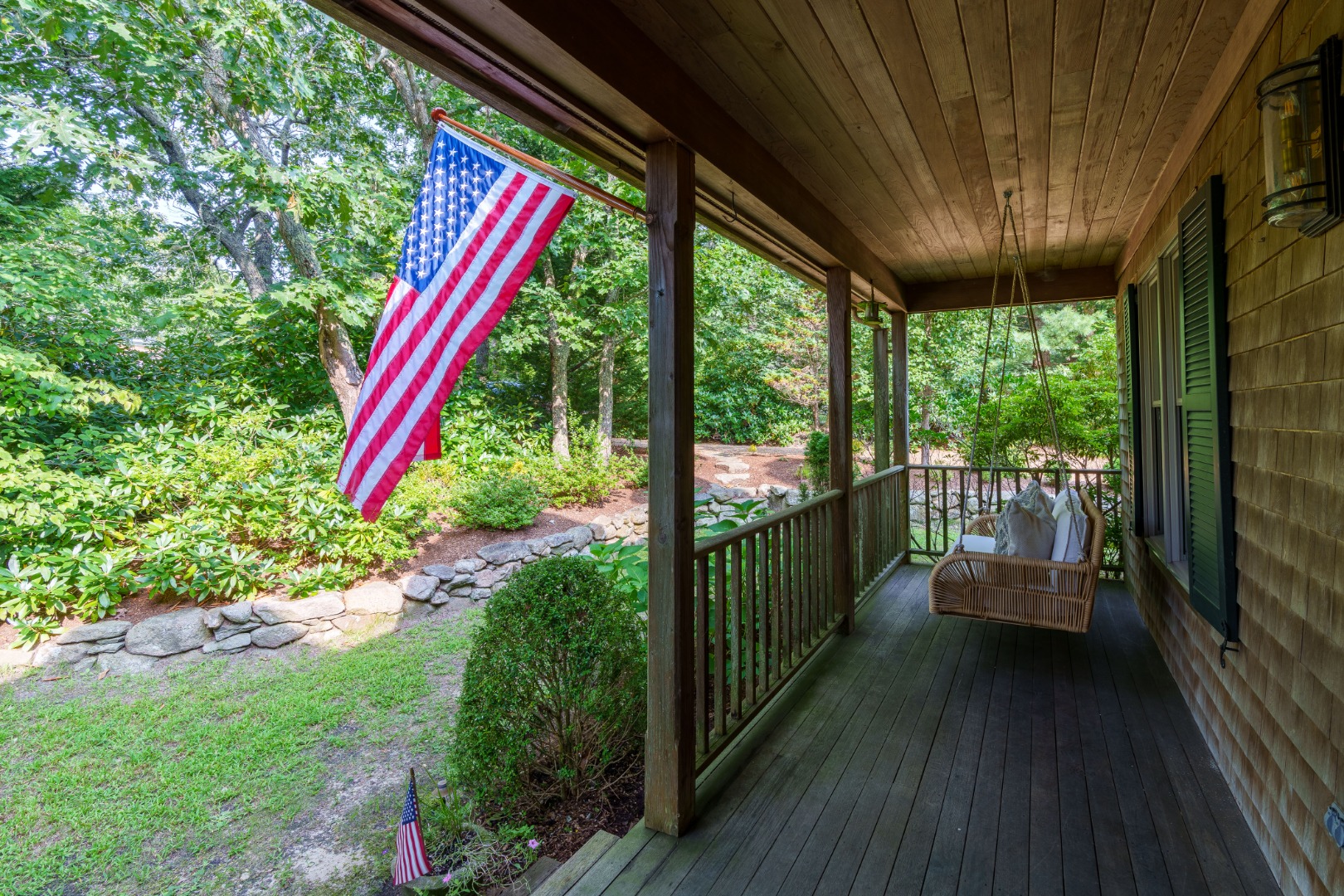 70 Marthas Road Edgartown, MA 02539 - Photo 5 of 54 a view of a balcony with chairs and wooden floor