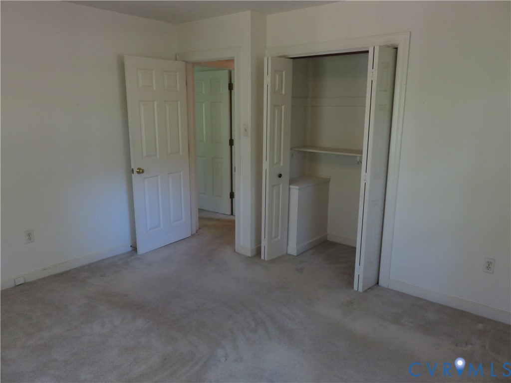 8379 Quailfield Road Mechanicsville, VA 23116 - Photo 37 of 56 wooden floor and closet in a room