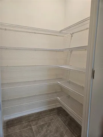 a empty closet with white paint