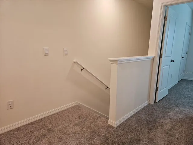 a bathroom with a granite countertop sink a toilet and a bathtub