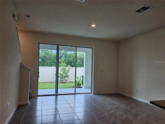 a view of an empty room with window
