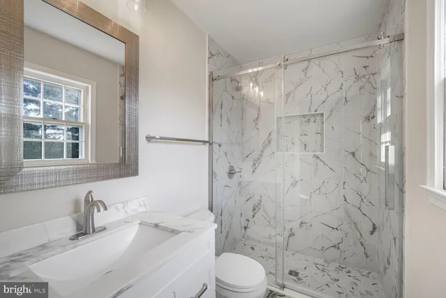 a view of house with yard and entertaining space