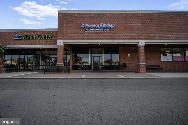 a view of a building with a street