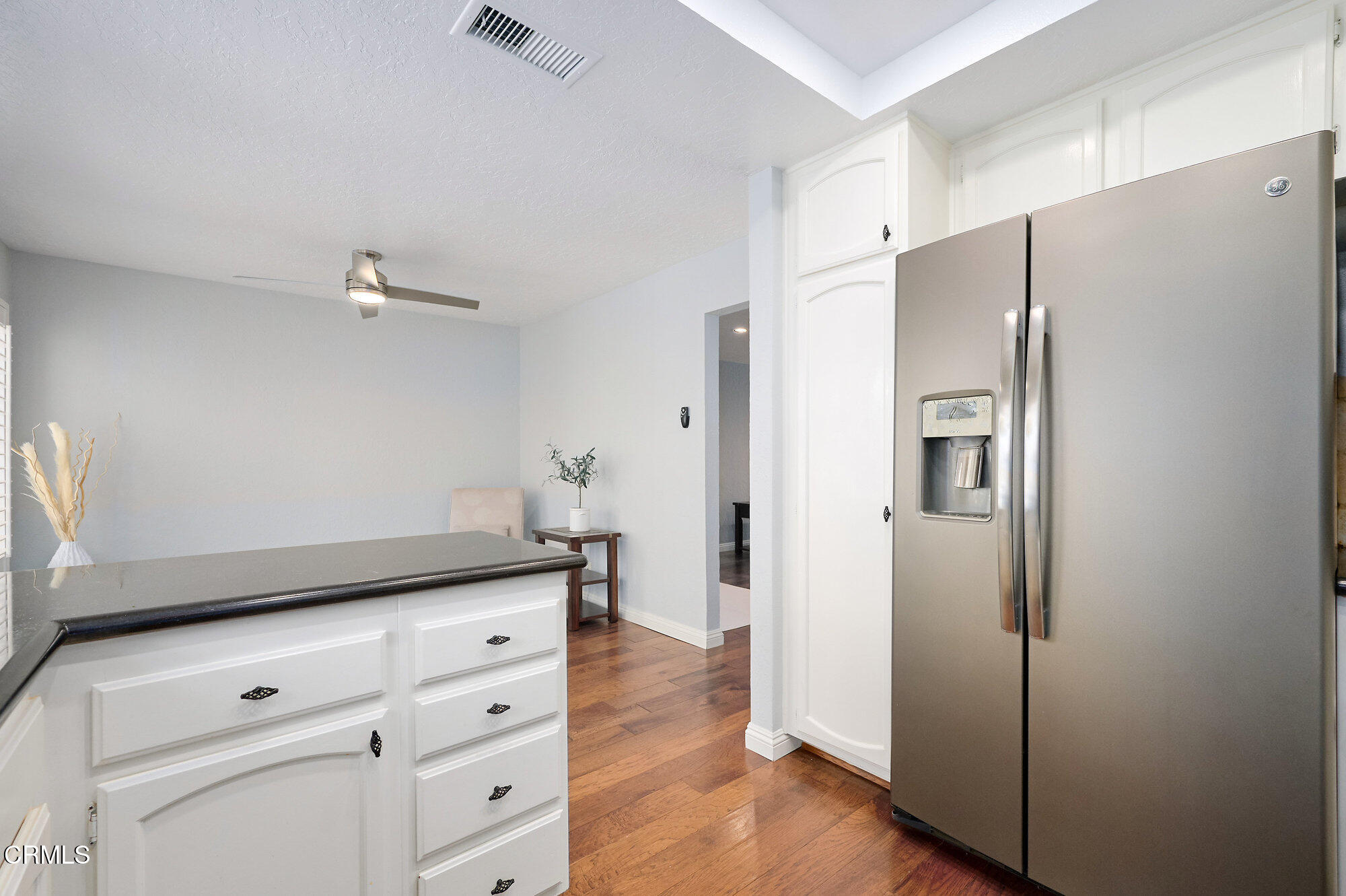 355 Jeremiah Drive, Unit D Simi Valley, CA 93065 - Photo 19 of 57 a kitchen with stainless steel appliances a refrigerator and a stove top oven