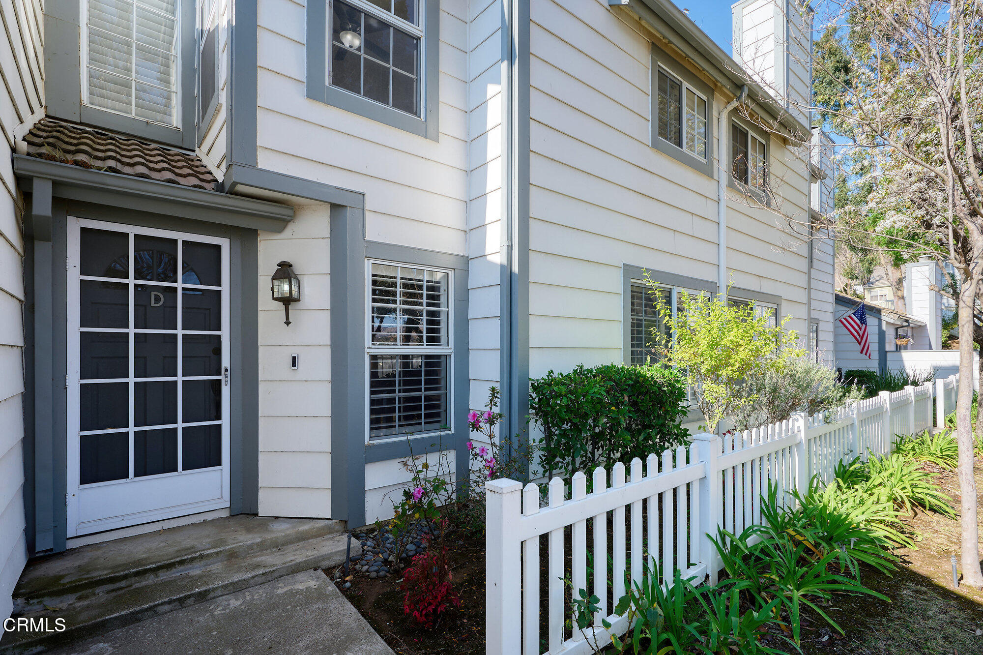 355 Jeremiah Drive, Unit D Simi Valley, CA 93065 - Photo 3 of 57 a house view with a garden space
