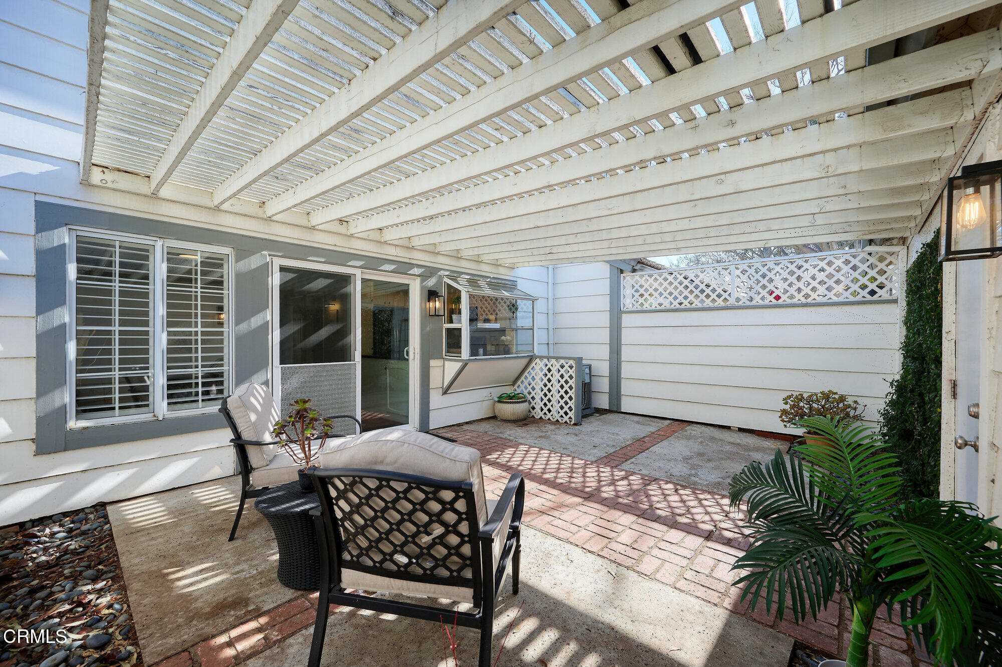 355 Jeremiah Drive, Unit D Simi Valley, CA 93065 - Photo 39 of 57 a balcony with furniture and a potted plant