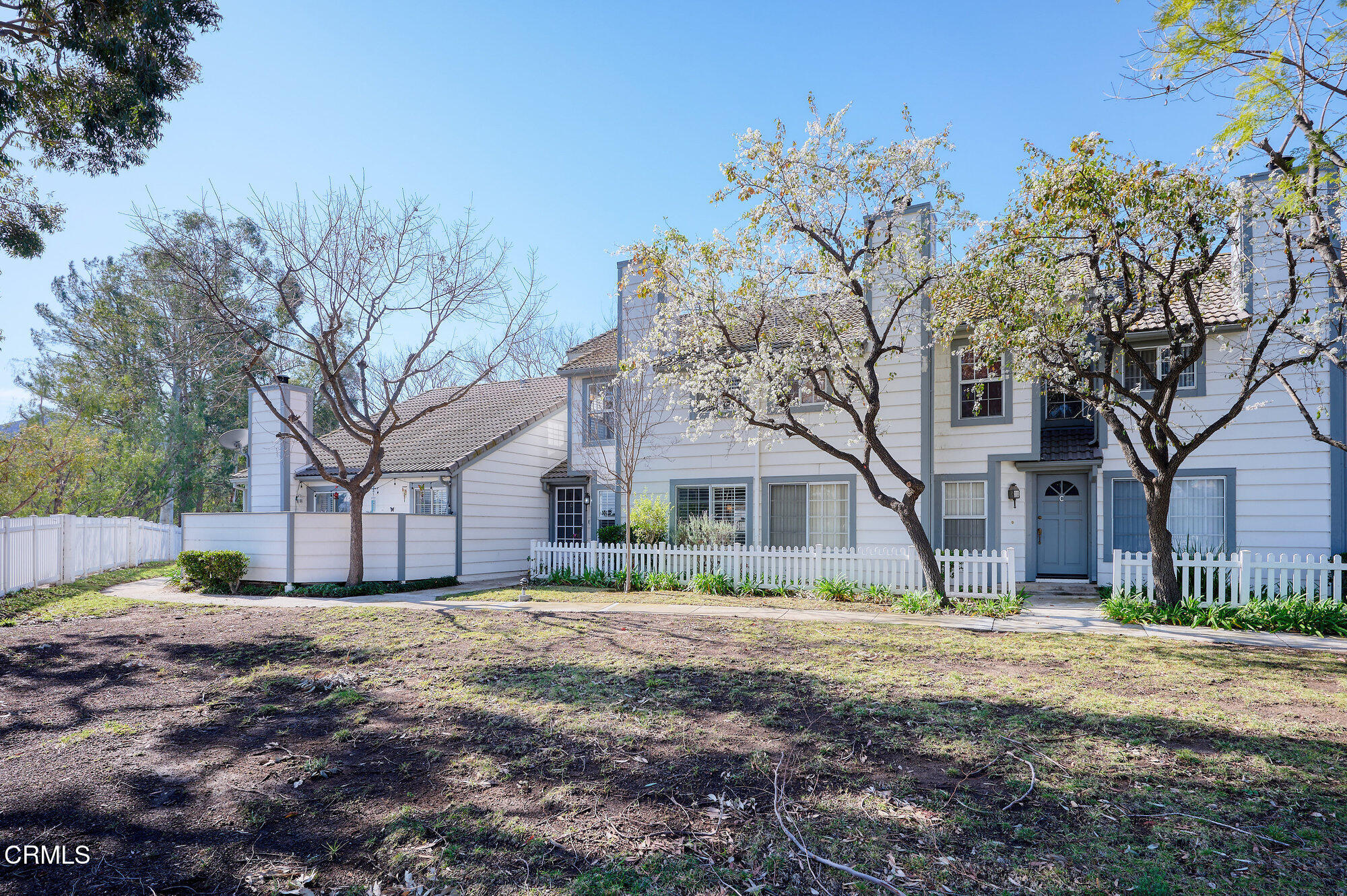 355 Jeremiah Drive, Unit D Simi Valley, CA 93065 - Photo 4 of 57 a house that has a tree in front of it