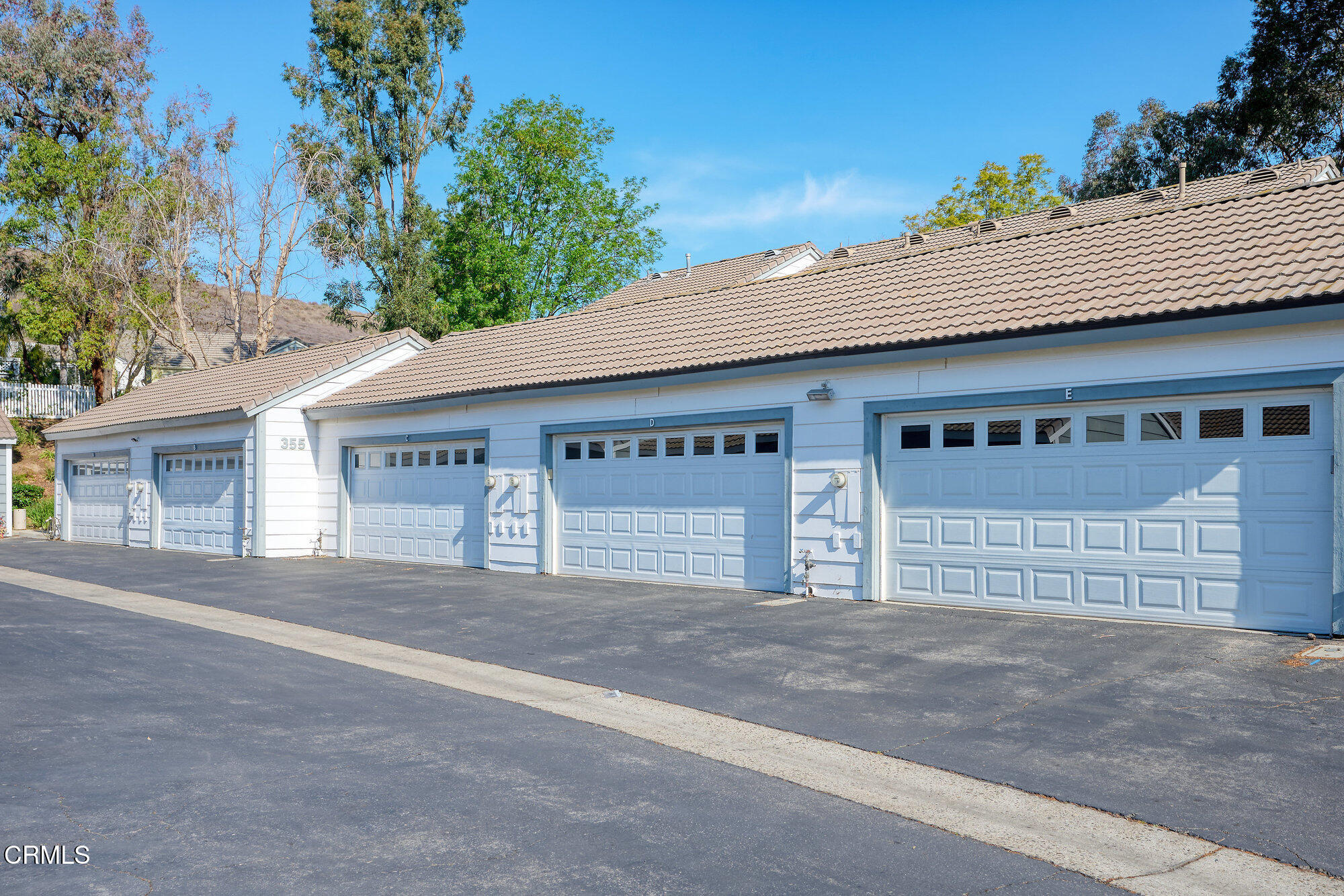 355 Jeremiah Drive, Unit D Simi Valley, CA 93065 - Photo 46 of 57 a front view of a house with a garage