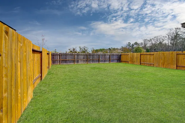 a view of a backyard with a garden