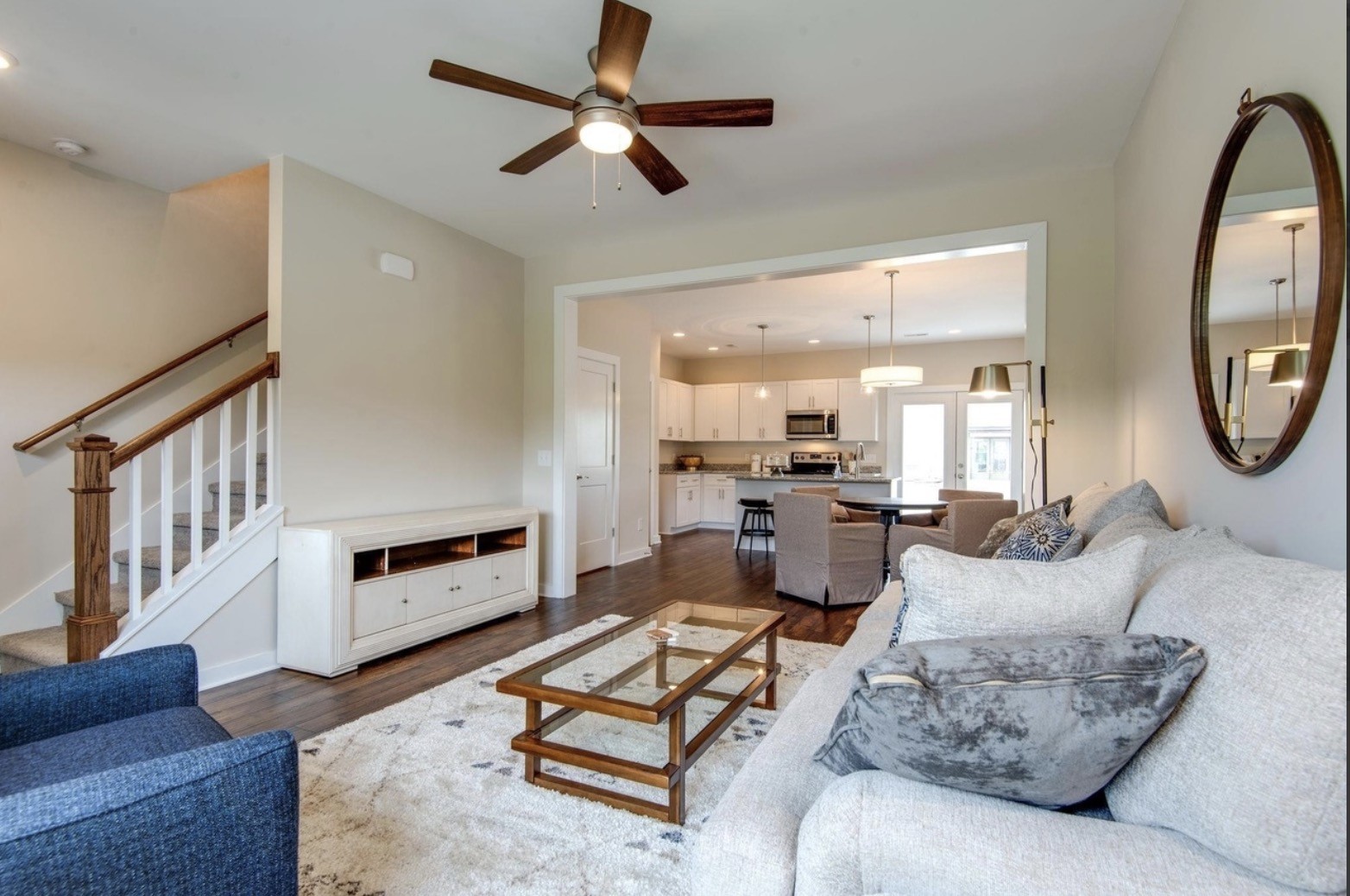2404 Danilynn Drive Antioch, TN 37013 - Photo 3 of 12 a living room with furniture a rug and a chandelier