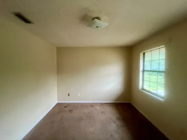 an empty room with a window