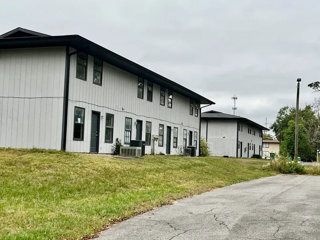 a house view with a garden space