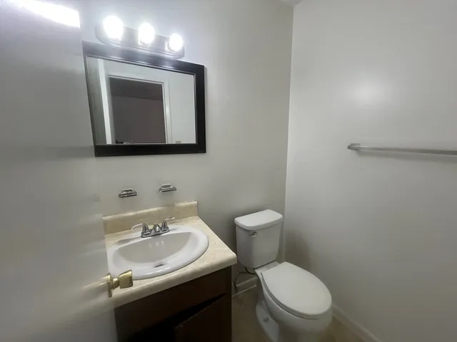 a bathroom with a sink and a shower