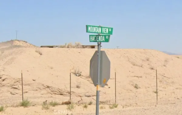 a view of a snow in the yard