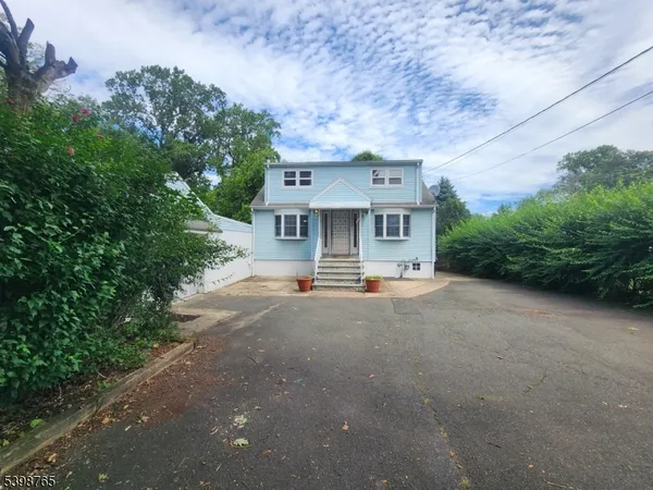 a view of house with outdoor space and street view