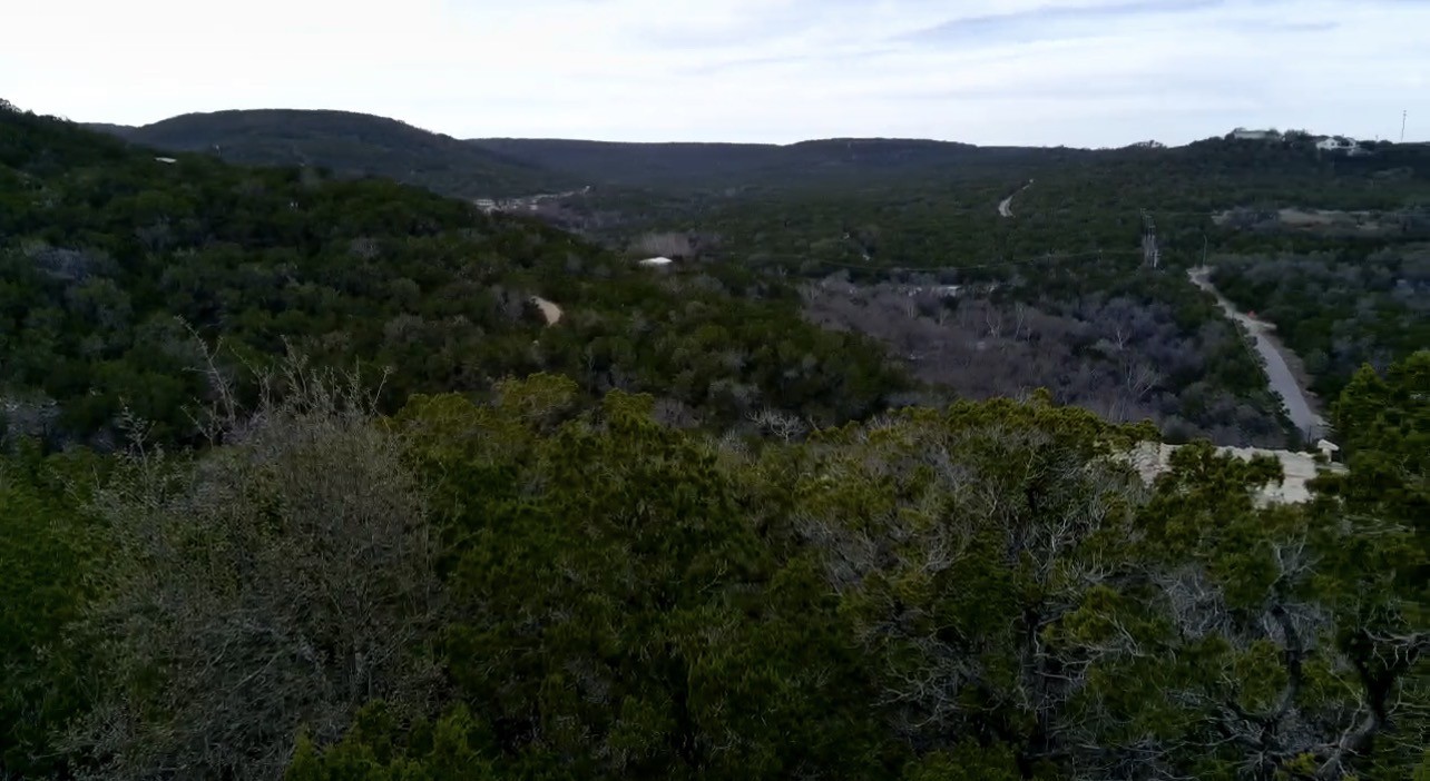 Tbd West Reed Park Road Jonestown, TX 78645 - Photo 12 of 14 a view of a town with mountains in the background
