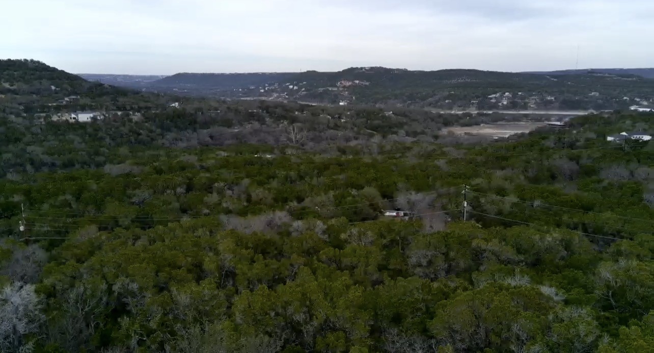 Tbd West Reed Park Road Jonestown, TX 78645 - Photo 14 of 14 a view of a city with lush green forest