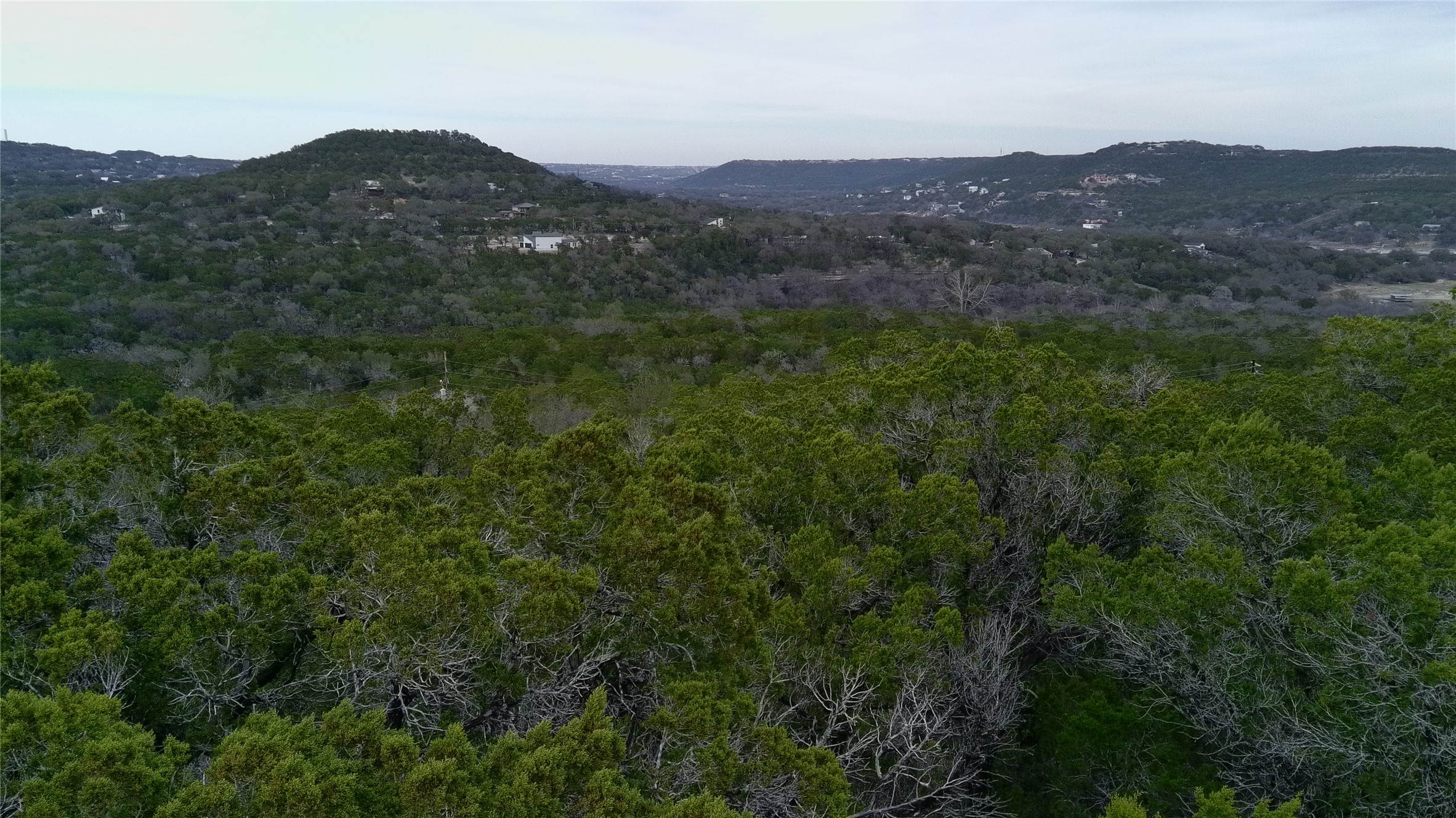 Tbd West Reed Park Road Jonestown, TX 78645 - Photo 3 of 14 a view of a lush green hillside and a mountain