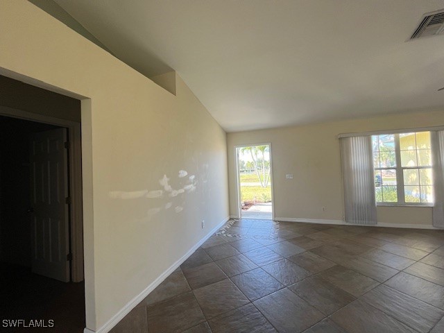 3527 Southwest 5th Street Cape Coral, FL 33991 - Photo 11 of 14 a view of an empty room with window and bathroom