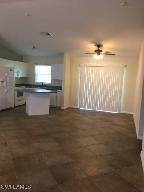 3527 Southwest 5th Street Cape Coral, FL 33991 - Photo 7 of 14 a view of kitchen and sink