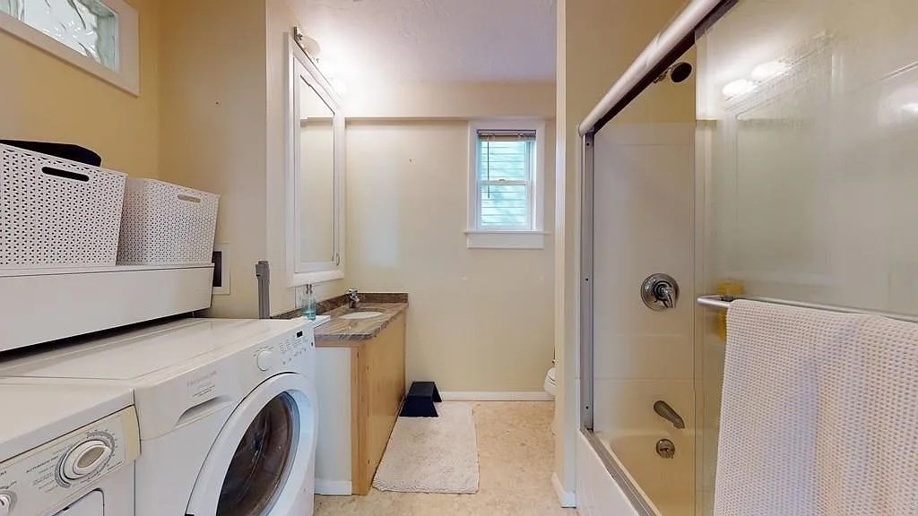 22 North Mead Street Boston, MA 02129 - Photo 5 of 7 a utility room with dryer and washer
