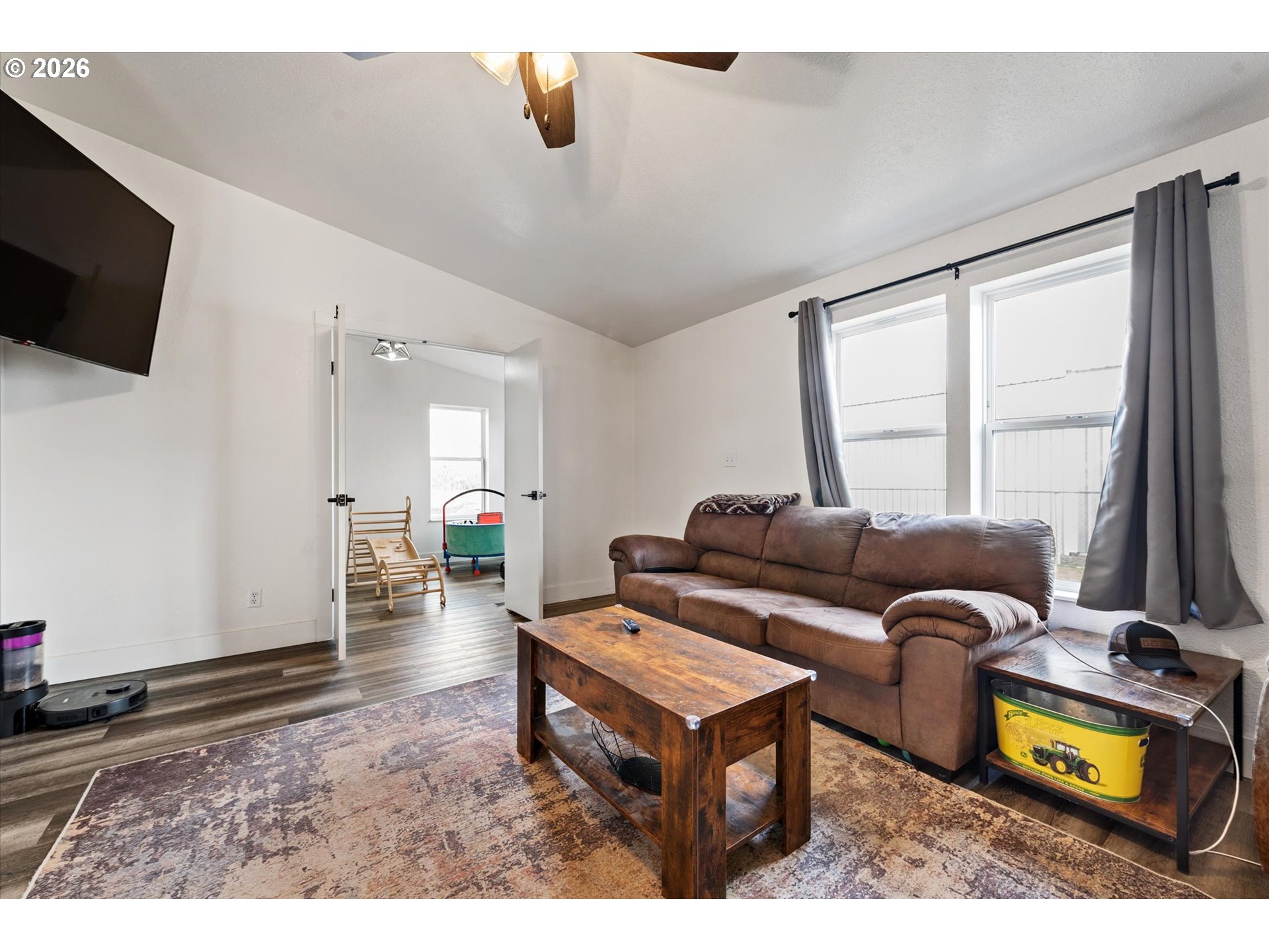 2106 Colorado Place Baker City, OR 97814 - Photo 20 of 40 a living room with furniture and a flat screen tv