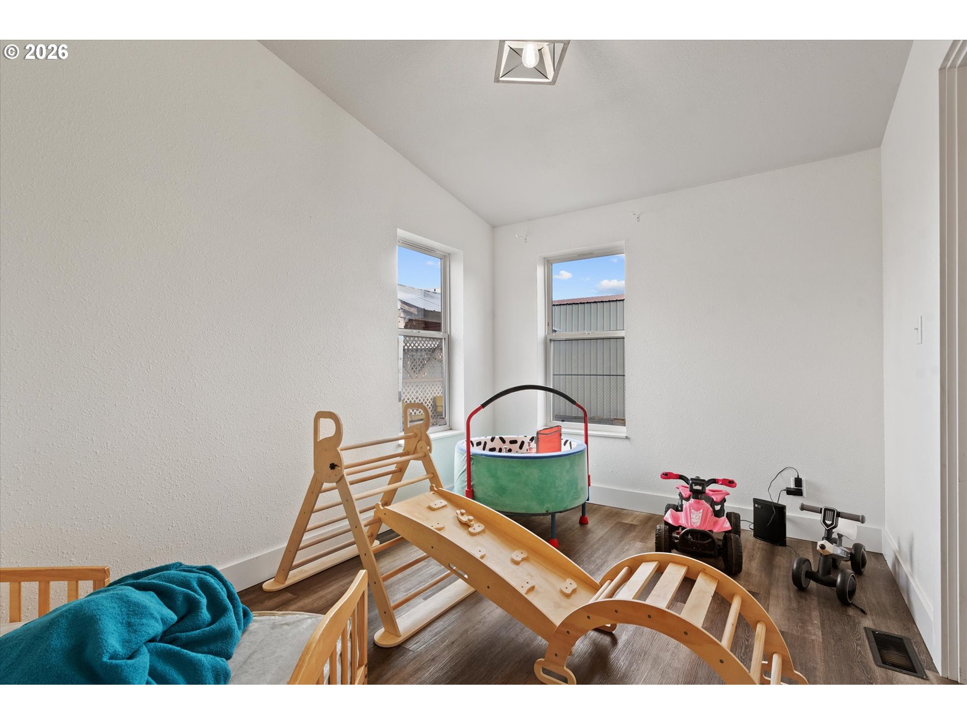 2106 Colorado Place Baker City, OR 97814 - Photo 23 of 40 a view of a room with toys and wooden floor