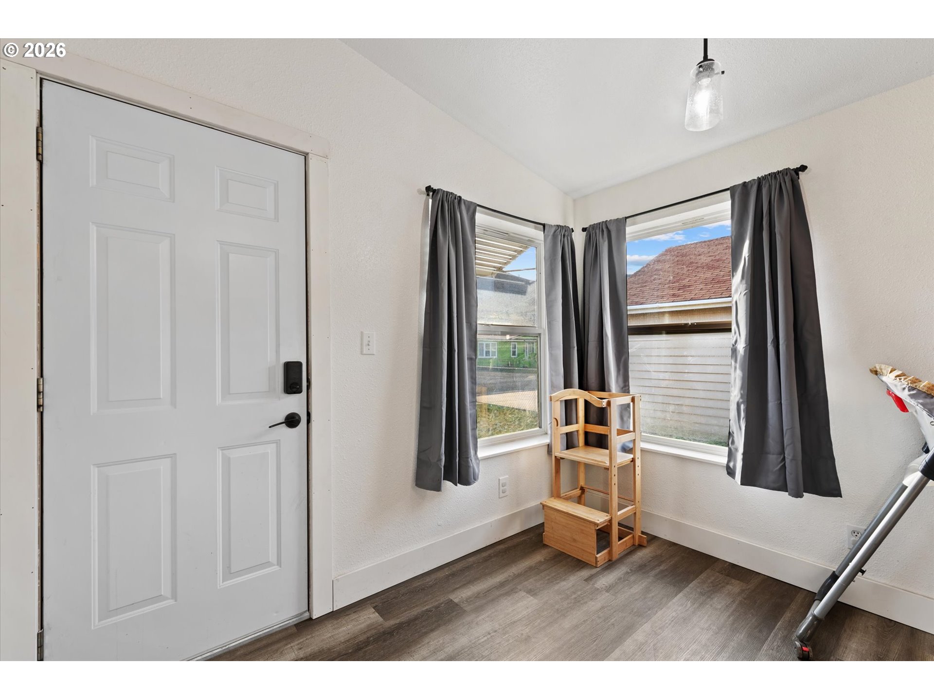 2106 Colorado Place Baker City, OR 97814 - Photo 30 of 40 a living room with hardwood floor and cabinet