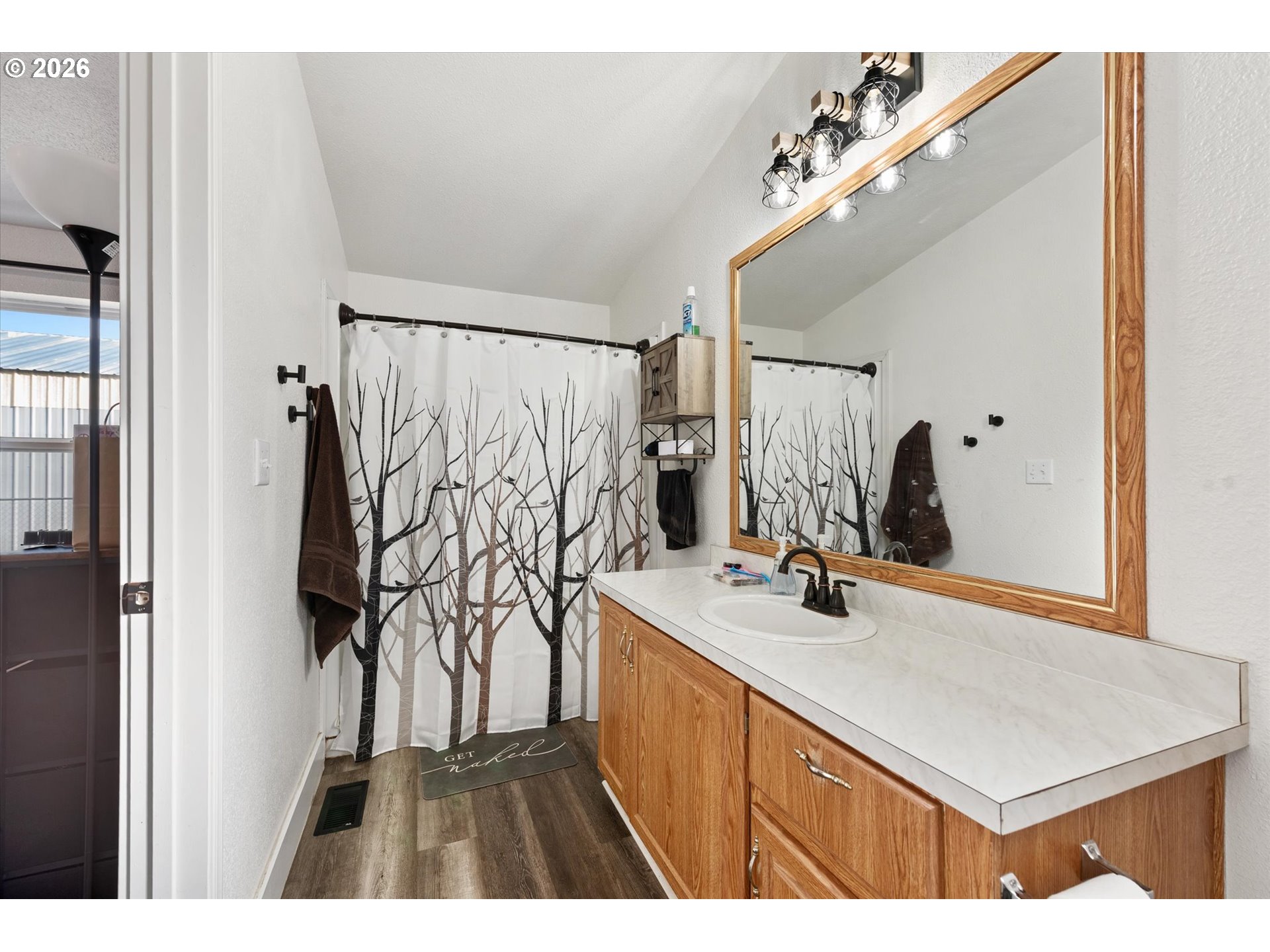 2106 Colorado Place Baker City, OR 97814 - Photo 33 of 40 a bathroom with a sink and a mirror