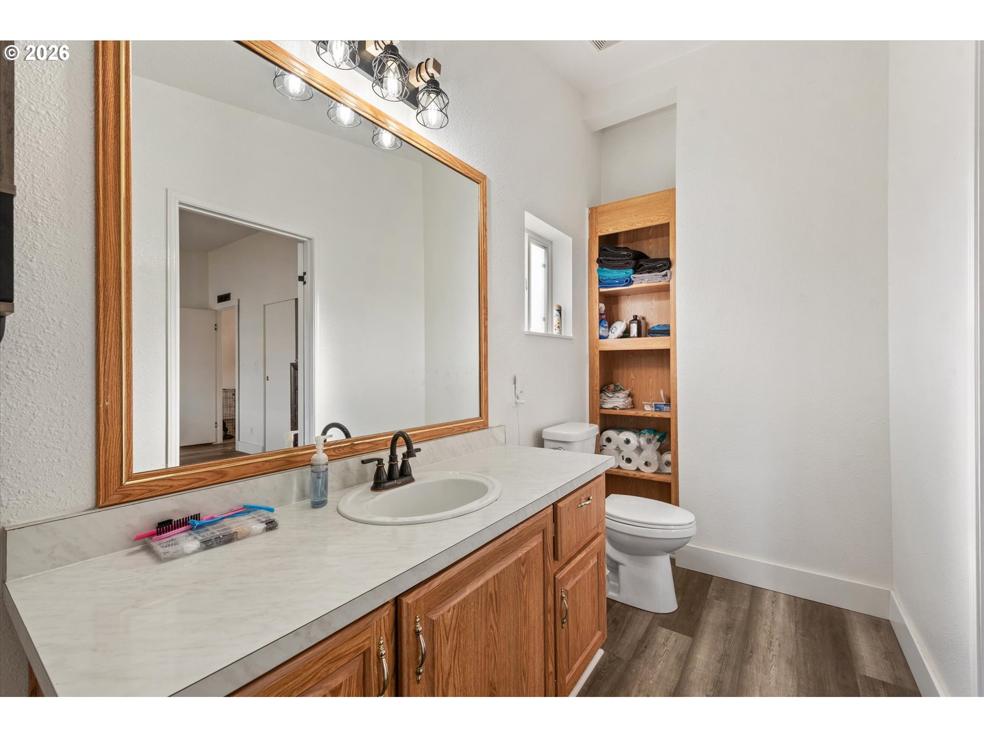 2106 Colorado Place Baker City, OR 97814 - Photo 34 of 40 a bathroom with a sink and a mirror