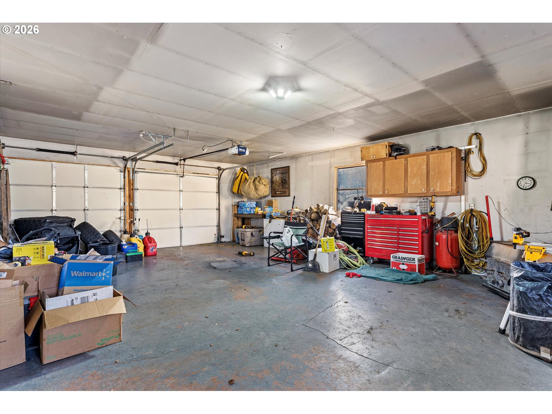2106 Colorado Place Baker City, OR 97814 - Photo 36 of 40 a view of a garage with a bike and car