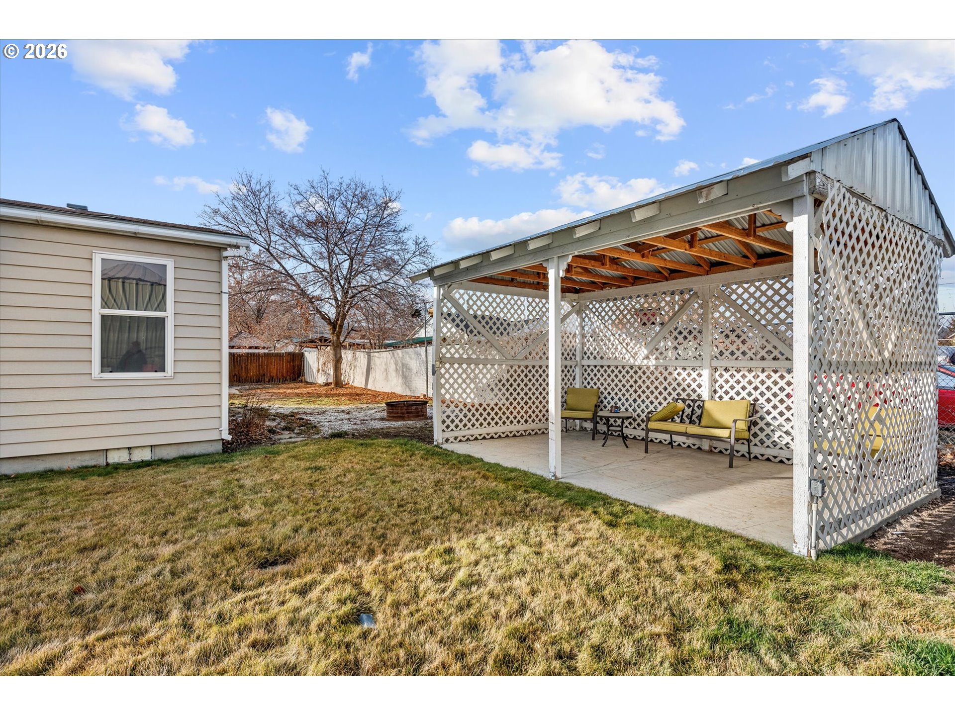 2106 Colorado Place Baker City, OR 97814 - Photo 6 of 40 a backyard of a house with a yard and seating space