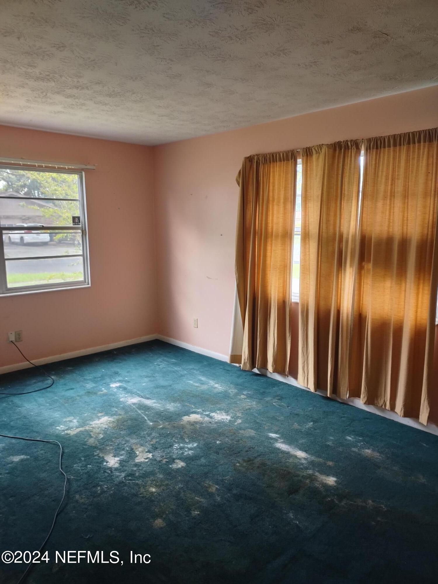 8181 Vermanth Road, Unit 11 Jacksonville, FL 32211 - Photo 4 of 23 20240526_111345_HDR