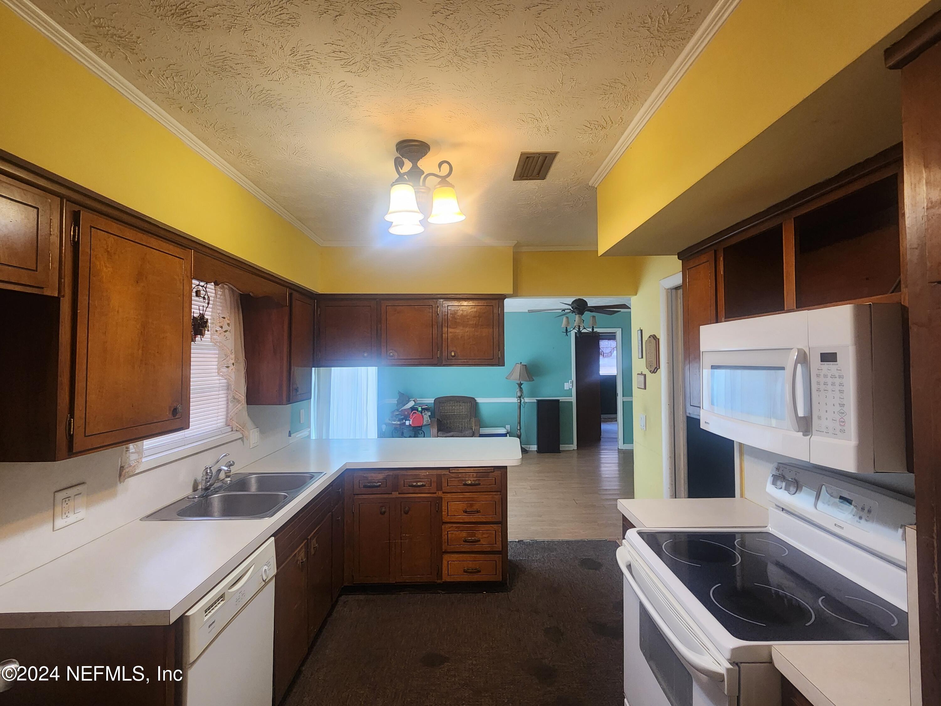 8181 Vermanth Road, Unit 11 Jacksonville, FL 32211 - Photo 9 of 23 20240525_104434