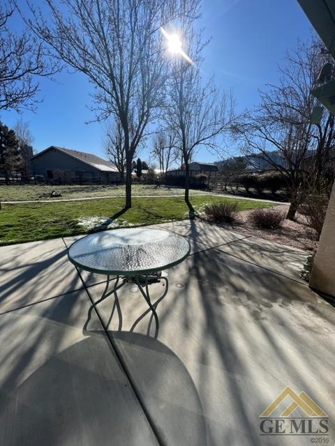 Undisclosed Address Tehachapi, CA 93561 - Photo 14 of 28 a swimming pool with lawn chairs and yard