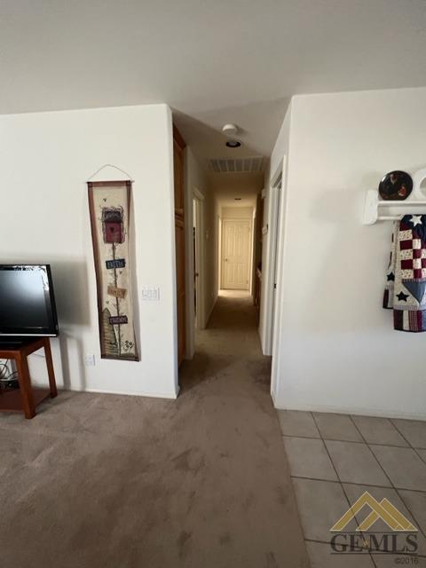 Undisclosed Address Tehachapi, CA 93561 - Photo 19 of 28 a view of a hallway with closet and front door