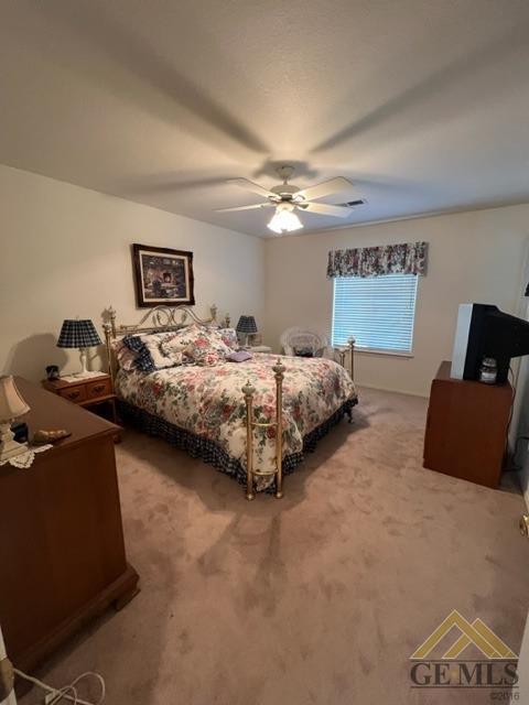 Undisclosed Address Tehachapi, CA 93561 - Photo 24 of 28 a bedroom with bed and window