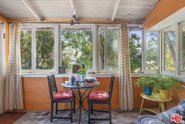 a living room with a couch and a fireplace