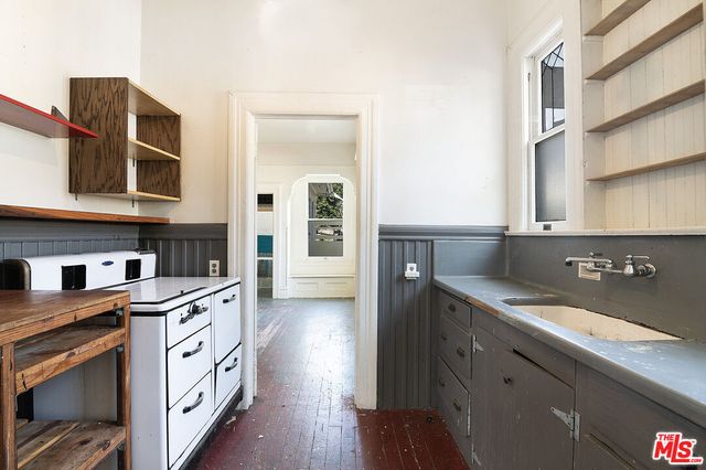 a view of a room with a large window