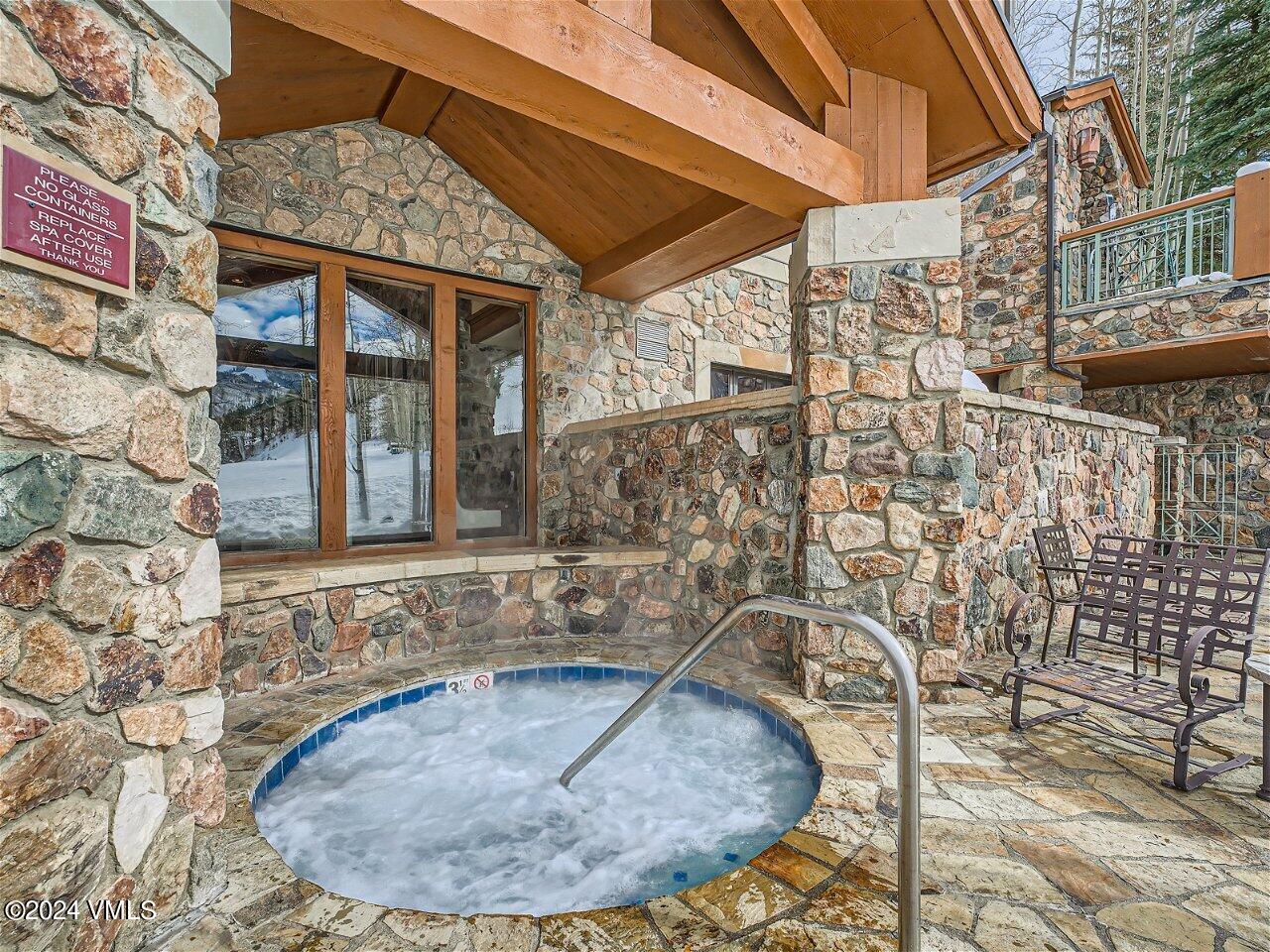 62 Highlands Lane, Unit R306 Beaver Creek, CO 81620 - Photo 27 of 32 swimming pool view with a outdoor seating